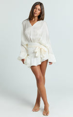 Carmela Mini Dress - Long Sleeve Tie Neck Ruffle Skirt Dress in Off White